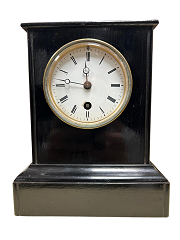 Small ebonised French mantel clock
