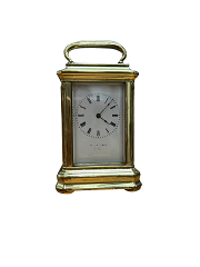 Miniature brass carriage clock